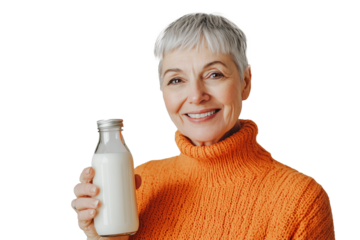 senior person with bottle of milk