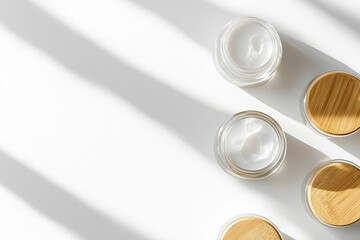 Cream jars arranged artistically, showcasing natural textures an