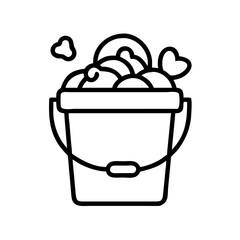 sand pail overflowing with seashells icon