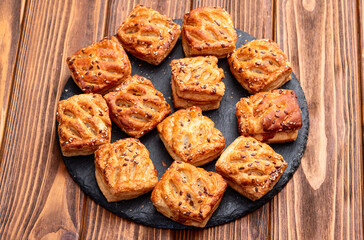 Flaky Pastries with Sesame Seeds on Slate