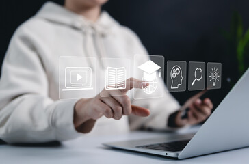 Online Education and E-Learning Concept. Person use laptop with icons representing online education, learning, knowledge sharing, educational tools, training, webinar on internet, digital courses,