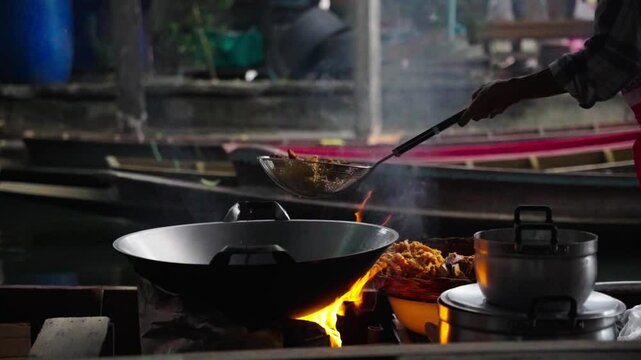 coocking on float market -slow motion