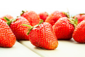 strawberry on white wood background
