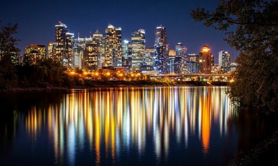 Naklejka premium Night city skyline reflected in water.