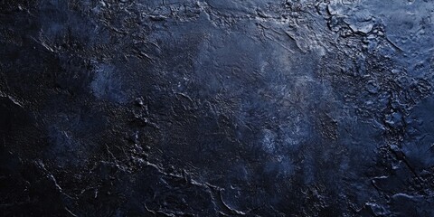 Fototapeta premium Textured dark blue-grey gradient backdrop with intricate surface detailing offering ample copy space for design use. Ideal for backgrounds.