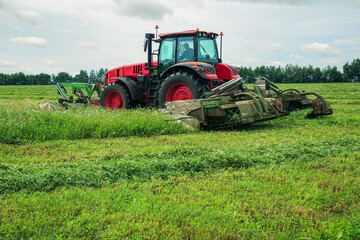 tractor. haying. harvesting grass. farming