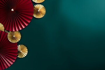 Red and gold paper fans on dark teal background. Festival or wedding traditional asian decoration. Chinese New Year, Mid-Autumn Festival. Frame with copy space for design greeting card, banner