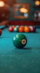 Green billiard ball with number 10 on green billiard table cloth. Ideal for themed articles about billiards, sports games and entertainment.