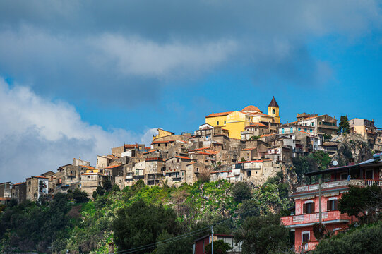 top view of the village of Grisolia with a cloudy sky in the background, Cosenza