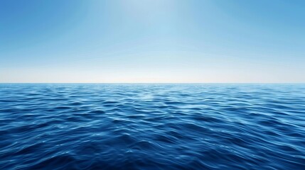 Obraz premium A serene view of calm ocean waters under a clear blue sky, evoking tranquility and peace.