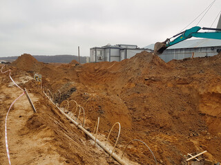 Innovative water lowering system utilizing needle filters in construction site excavation for...