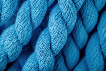 Intricate Blue Yarn Texture: A Close-Up of Twisted Threads