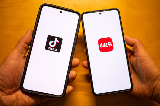 Qingdao,China-Jan.14.2025:REDnote and TikTok apps on smartphone screen. Chinese social media applications.TikTok users flock to Chinese app RedNote as US ban looms.TikTok refugees