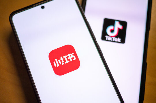 Qingdao,China-Jan.14.2025:REDnote and TikTok apps on smartphone screen. Chinese social media applications.TikTok users flock to Chinese app RedNote as US ban looms.TikTok refugees