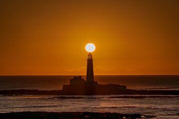 Lighthouse at sunrise