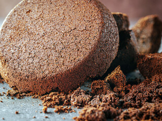 Close-up of coffee grounds from espresso machine. coffee ground on gray background