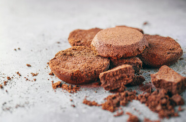 Close-up of coffee grounds from espresso machine. coffee ground on gray background