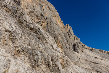 Dolomites rocky summits in the Alps. High tower peaks and sharp mountain rocky peaks of the Alps in the Dolomiti region, Italy. Beautiful scenic mountain range landscape in summer