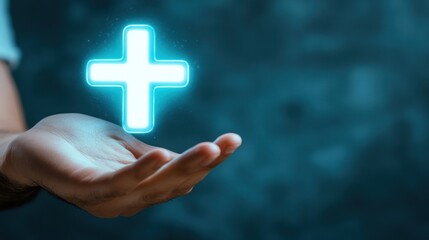 Fototapeta premium Glowing Cross in Hand: A Symbol of Faith and Hope