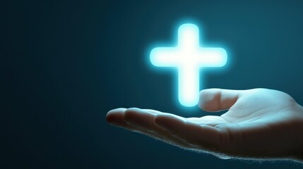 Obraz premium Glowing Cross in Hand: A Symbol of Faith and Hope