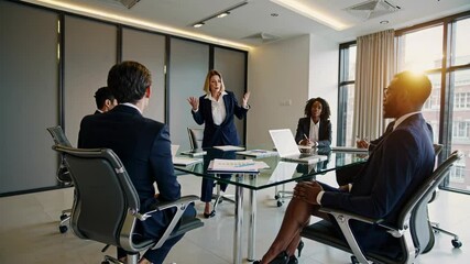 Professional businesswoman presenting strategic insights to multicultural team members during collaborative meeting in contemporary workplace environment. Business meeting concept