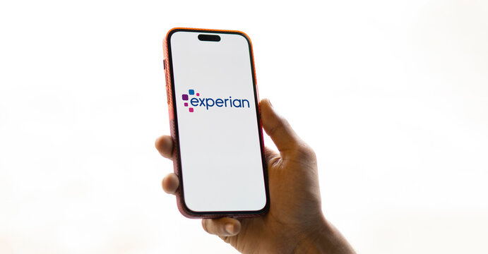 Dhaka, Bangladesh- 11 Dec 2024: experian logo is displayed on smartphone. Experian plc is a multinational data analytics and consumer credit reporting company.