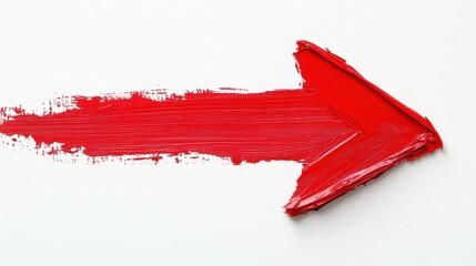 red paint strokes forming an arrow against a white background, symbolizing direction and creativity. the bold contrast enhances the impact, making a strong visual statement