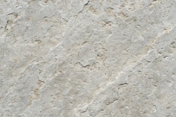 High-resolution image of a light grey stone texture with natural cracks and fissures