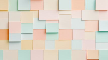 Colorful paper squares arranged in creative pattern, showcasing pastel shades. This vibrant backdrop adds playful touch to any design project