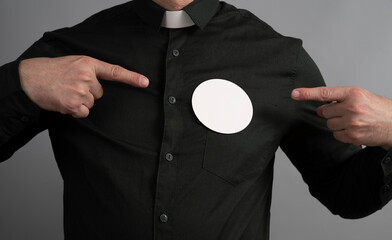 Round badge sticky label mockup template. Church Fundraising pastor's finger pointing to pin button on chest. White tags, paper round stickers, isolated rounded signs