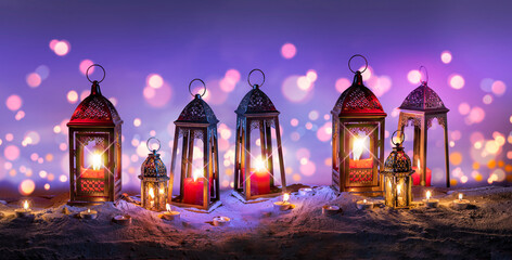Ramadan. Arabic lantern for Muslim holy month Ramazan Kareem. Decorative Holiday lamps on the sand at night in the desert. Symbol of fasting sawm, prayer salah © TSViPhoto
