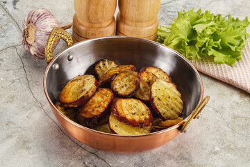 Baked red batat slices with herbs