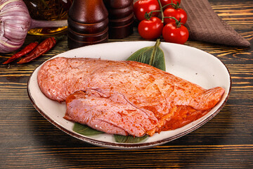 Raw marinated duck breast for cooking