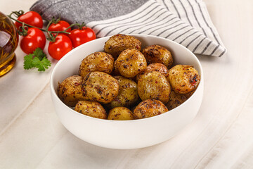 Baked mini potato with herbs