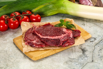 Raw beef cheeks cut for cooking