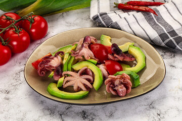 Salad with baby octopus and avocado