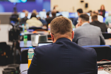 Fototapeta premium Journalists and correspondents working in media press center, live broadcasting, tv studio channel office, news report coverage of the political forum event, cameraman and editor, creating the news