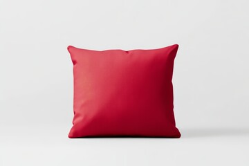 A vibrant red cushion set against a minimalistic background, showcasing its clean lines and soft texture, perfect for home decor.