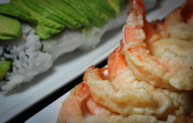 Shrimp and rolls on a plate