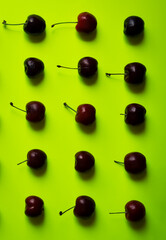 Cherry on green backgrounds