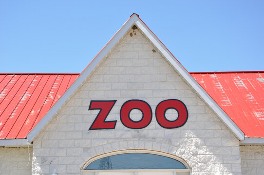 Zoo sign in front of the building