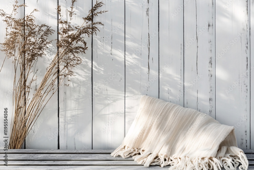 Aufkleber cozy blanket and dry plants creating a relaxing atmosphere on white wood background
