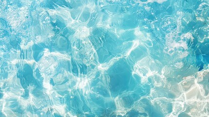 Obraz premium A mesmerizing view of clear turquoise water with light reflecting and creating a beautiful abstract pattern