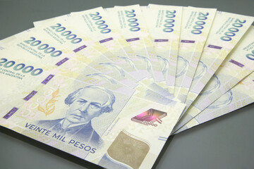 Argentine Money, Currency of Argentine, Pesos argentinos, various bills on dark background. Twenty...