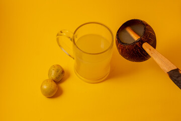 Freshly squeezed Marula (Sclerocarya birrea, Morula, Maroela, Mufula) fruit juice and traditional fermented beverage