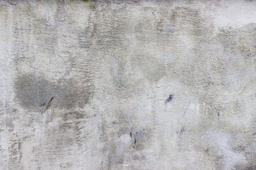 Unfinished fresh plaster on the wall.