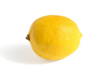 There is a juicy ripe yellow lemon on a white background.