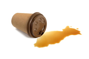 On a white background lies a paper cup with spilled coffee residue.