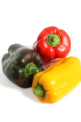 Bright sweet pepper lies on a white background.