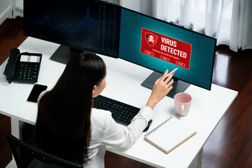 Virus warning alert on computer screen detected brisk cyber threat , hacker, computer virus and malware